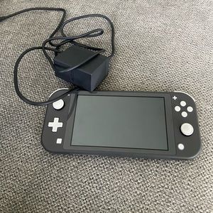 Nintendo Switch Lite and Super Mario Bros U Deluxe Game